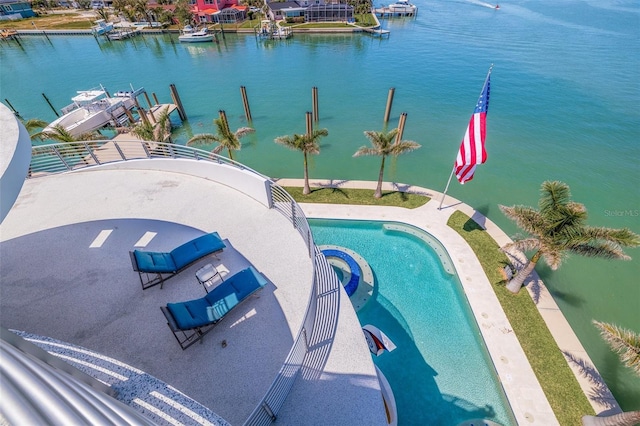 12650 7th St E, Treasure Island, FL 33706 - outdoor pool featuring a patio area and a water view