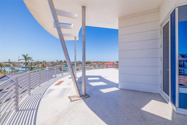 12650 7th St E, Treasure Island, FL 33706 - view of patio / terrace featuring a water view and a balcony