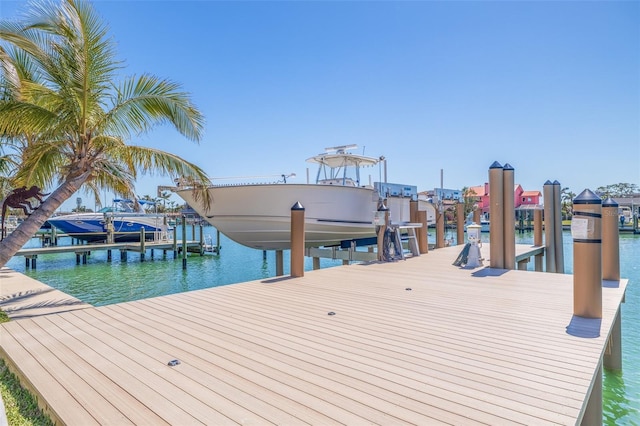 12650 7th St E, Treasure Island, FL 33706 - view of dock with a water view and boat lift