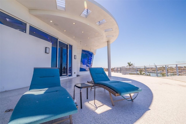12650 7th St E, Treasure Island, FL 33706 - view of patio with fence