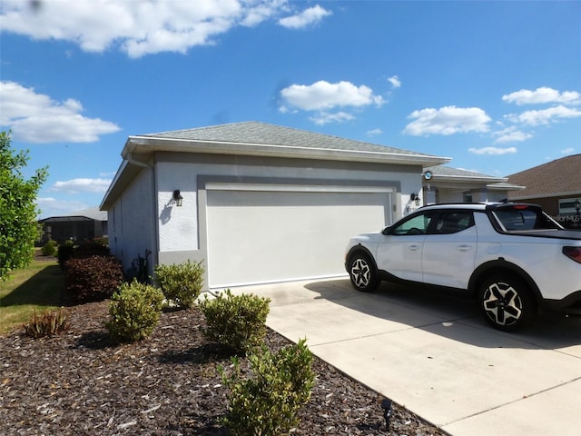 8890 SW 104th Cir, Ocala, FL 34481 - view of property exterior with concrete driveway, a garage, and stucco siding