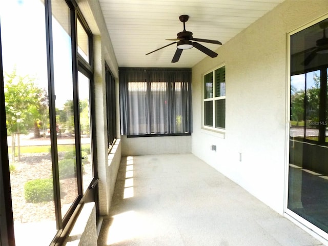 8890 SW 104th Cir, Ocala, FL 34481 - unfurnished sunroom featuring a ceiling fan