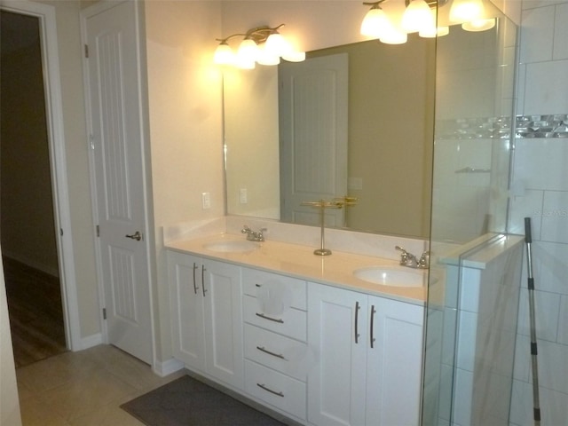 8890 SW 104th Cir, Ocala, FL 34481 - bathroom with double vanity and tile patterned flooring