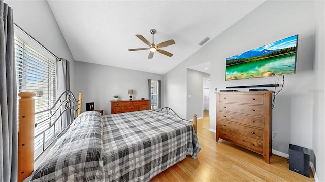 1613 E Del Webb Blvd, Sun City Center, FL 33573 - bedroom featuring lofted ceiling, light wood-style flooring, ceiling fan, and baseboards