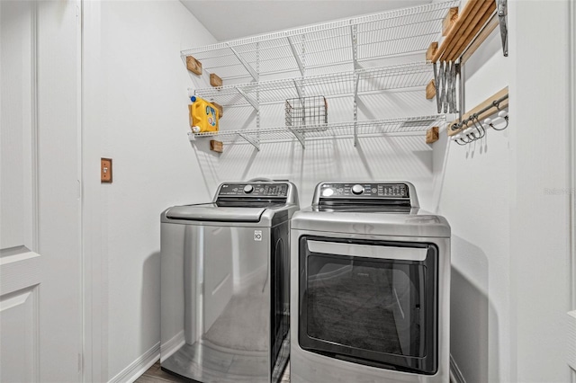 5429 Companion Ln, Tampa, FL 33619 - laundry room featuring washing machine and clothes dryer and laundry area