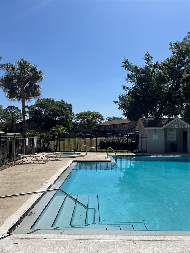 pool featuring fence