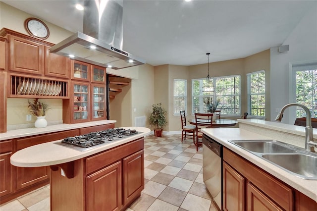 16420 Iola Woods Trl, Dade City, FL 33523 - kitchen featuring wall chimney range hood, light countertops, a sink, and appliances with stainless steel finishes