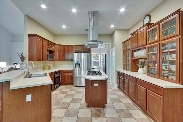 16420 Iola Woods Trl, Dade City, FL 33523 - kitchen with a center island, a sink, appliances with stainless steel finishes, a peninsula, and island exhaust hood