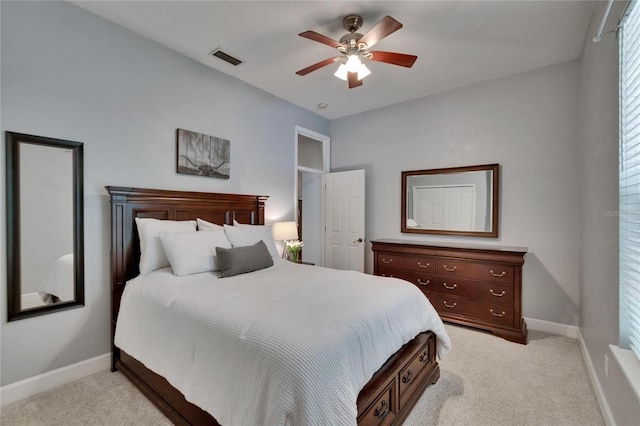 16420 Iola Woods Trl, Dade City, FL 33523 - bedroom with ceiling fan, light colored carpet, baseboards, and visible vents