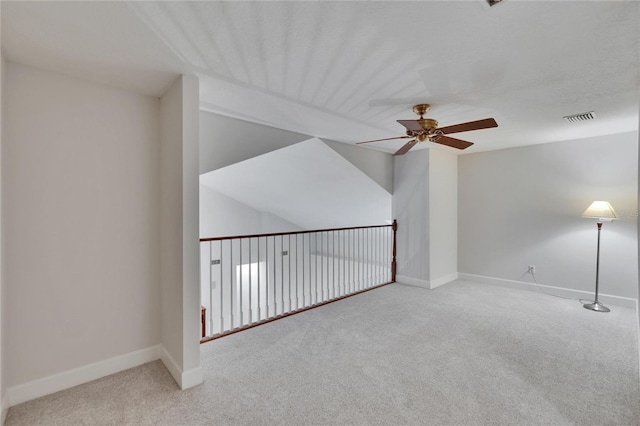 16420 Iola Woods Trl, Dade City, FL 33523 - bonus room with visible vents, carpet floors, baseboards, and ceiling fan