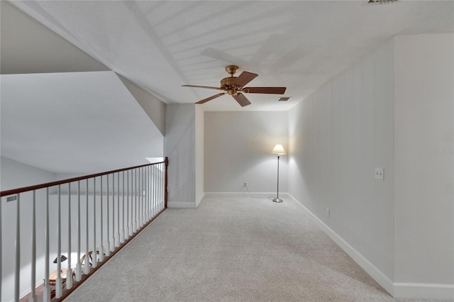 16420 Iola Woods Trl, Dade City, FL 33523 - interior space featuring visible vents, baseboards, a ceiling fan, and carpet