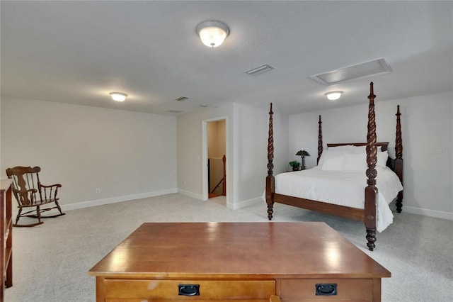 16420 Iola Woods Trl, Dade City, FL 33523 - bedroom with light carpet, visible vents, baseboards, and attic access