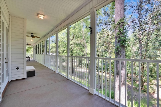 16420 Iola Woods Trl, Dade City, FL 33523 - unfurnished sunroom with a ceiling fan
