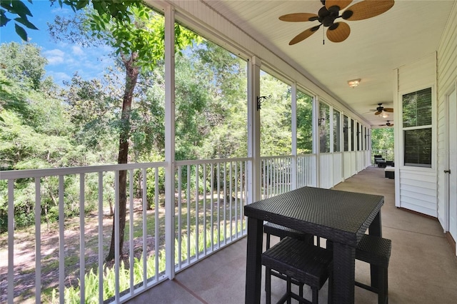16420 Iola Woods Trl, Dade City, FL 33523 - sunroom with a ceiling fan