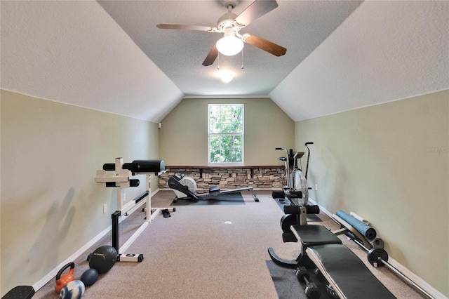 16420 Iola Woods Trl, Dade City, FL 33523 - workout area featuring baseboards, vaulted ceiling, carpet flooring, a textured ceiling, and a ceiling fan