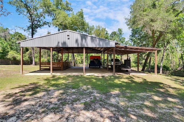 16420 Iola Woods Trl, Dade City, FL 33523 - view of parking with a covered structure
