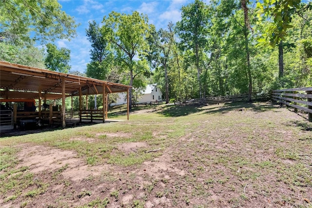 16420 Iola Woods Trl, Dade City, FL 33523 - view of yard featuring an outbuilding and an exterior structure
