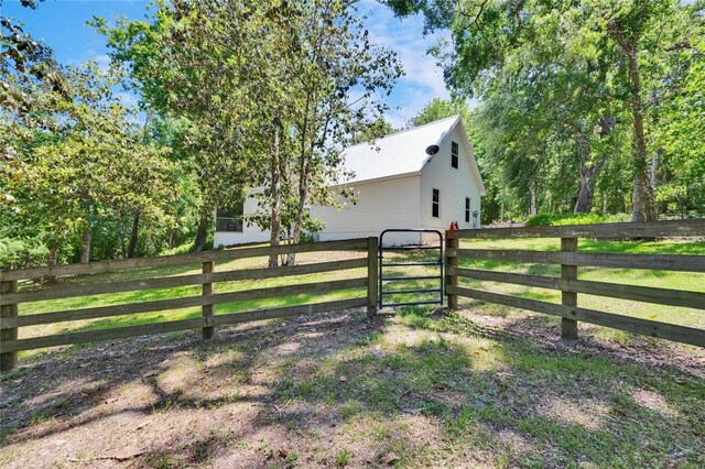 16420 Iola Woods Trl, Dade City, FL 33523 - exterior space featuring fence and a lawn