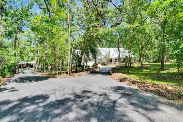 16420 Iola Woods Trl, Dade City, FL 33523 - view of street featuring aphalt driveway