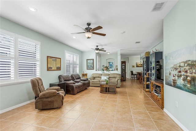 8116 Sanguinelli Rd, Land O Lakes, FL 34637 - living room with light tile patterned floors, visible vents, recessed lighting, and ceiling fan