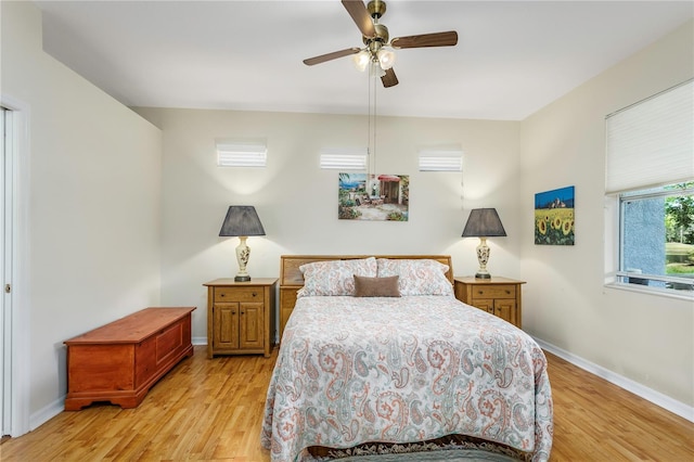 8116 Sanguinelli Rd, Land O Lakes, FL 34637 - bedroom with ceiling fan, baseboards, and light wood-type flooring