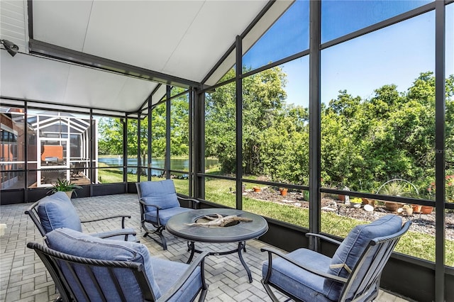 8116 Sanguinelli Rd, Land O Lakes, FL 34637 - sunroom / solarium featuring a water view
