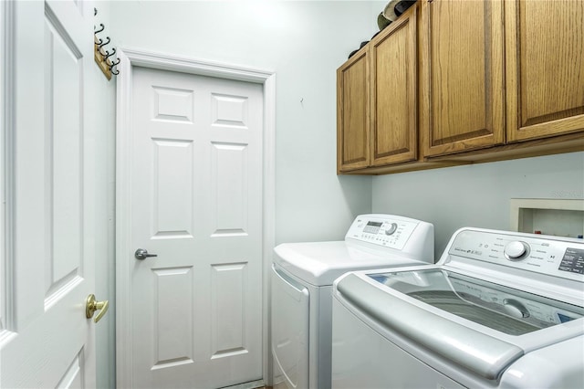 8116 Sanguinelli Rd, Land O Lakes, FL 34637 - laundry room featuring cabinet space and washer and dryer