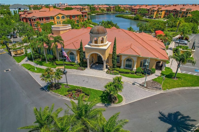 2746 Via Tivoli Unit 135A, Clearwater, FL 33764 - view of building exterior featuring a water view and a residential view