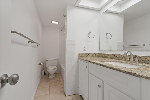 105 4th Ave NE Unit 220, Saint Petersburg, FL 33701 - full bath featuring shower / washtub combination, vanity, toilet, tile patterned floors, and baseboards