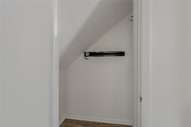 105 4th Ave NE Unit 220, Saint Petersburg, FL 33701 - bonus room with wood finished floors, baseboards, and lofted ceiling
