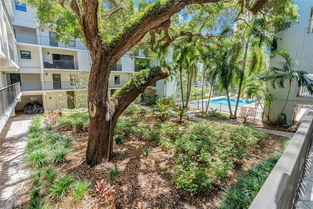 105 4th Ave NE Unit 220, Saint Petersburg, FL 33701 - view of property's community with a swimming pool