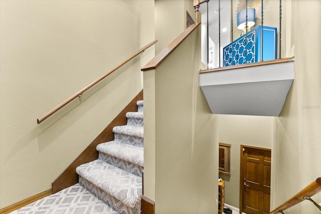 staircase with baseboards