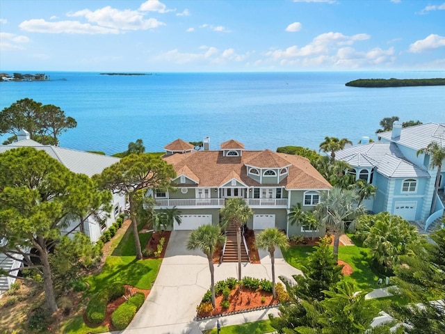 birds eye view of property featuring a water view