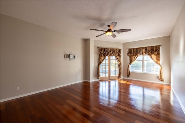 9159 Highland Ridge Way, Tampa, FL 33647 - spare room featuring a textured ceiling, wood finished floors, baseboards, and a ceiling fan