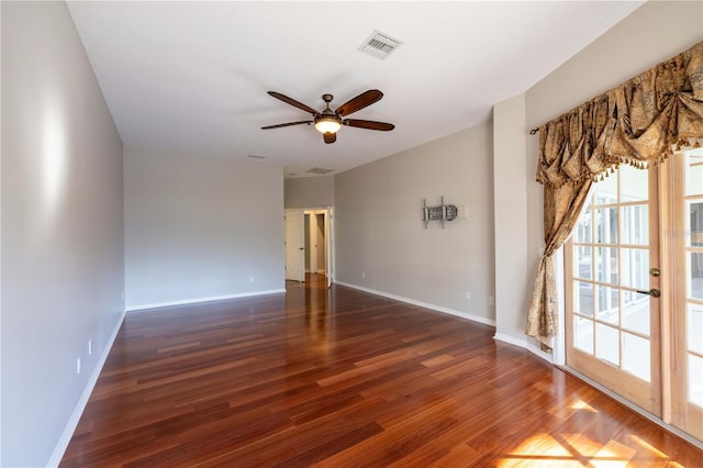 9159 Highland Ridge Way, Tampa, FL 33647 - spare room featuring visible vents, baseboards, a ceiling fan, and wood finished floors