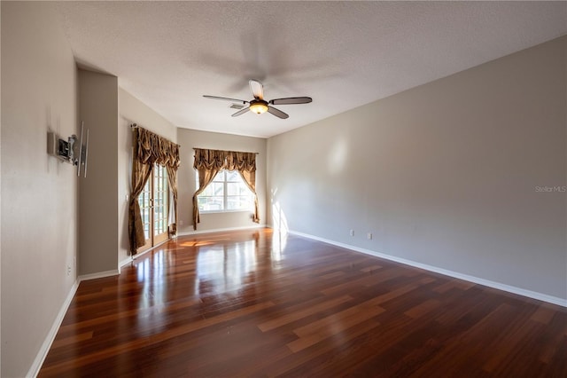9159 Highland Ridge Way, Tampa, FL 33647 - unfurnished room featuring baseboards, a textured ceiling, a ceiling fan, and wood finished floors