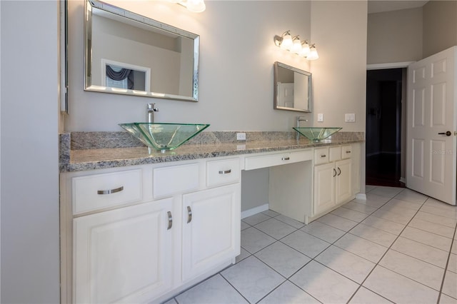 9159 Highland Ridge Way, Tampa, FL 33647 - bathroom with tile patterned flooring, double vanity, and a sink