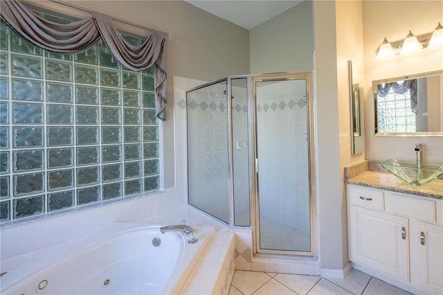 9159 Highland Ridge Way, Tampa, FL 33647 - full bath featuring a shower stall, tile patterned floors, and a whirlpool tub