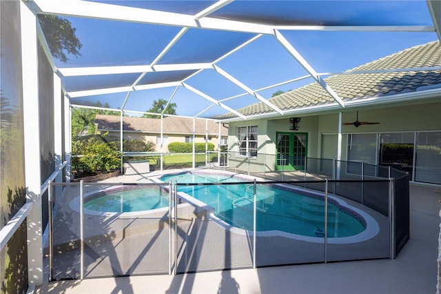 9159 Highland Ridge Way, Tampa, FL 33647 - view of pool with a lanai, a patio, ceiling fan, and a pool with connected hot tub