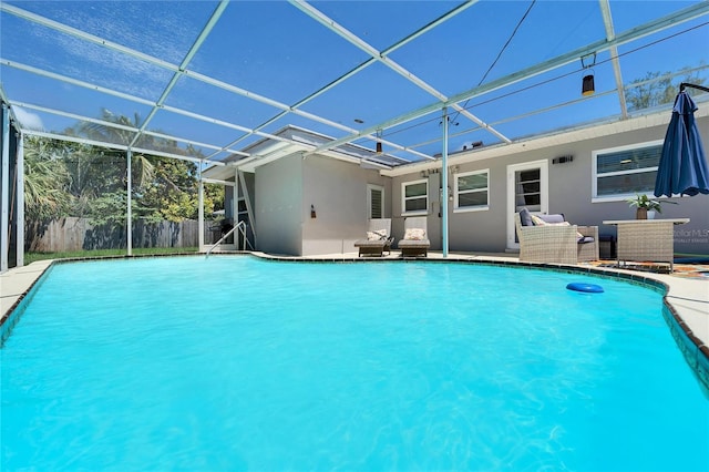 view of pool featuring fence, a patio area, a lanai, and a fenced in pool