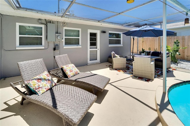 view of patio featuring electric panel, an outdoor hangout area, an outdoor pool, and fence