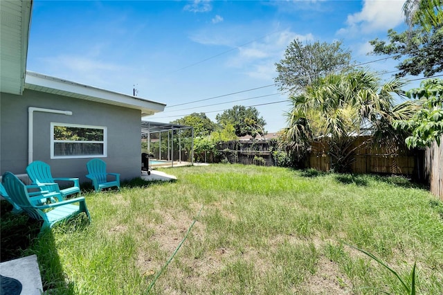 view of yard with a fenced backyard