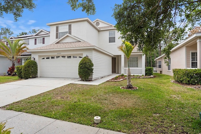 20123 Bay Cedar Ave, Tampa, FL 33647 - traditional home featuring driveway, a garage, a shingled roof, a front yard, and stucco siding