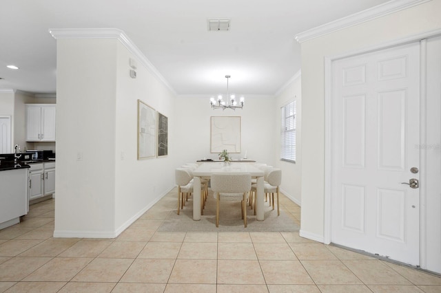 20123 Bay Cedar Ave, Tampa, FL 33647 - dining room featuring ornamental molding, visible vents, and light tile patterned floors