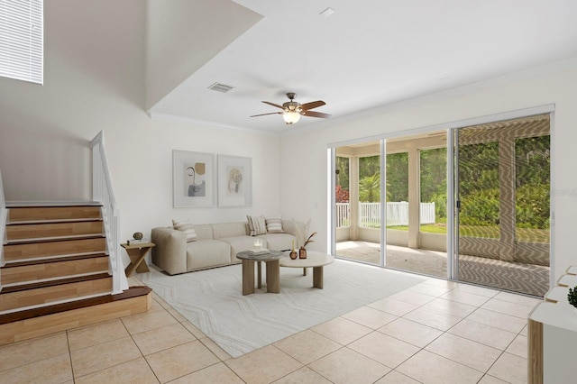20123 Bay Cedar Ave, Tampa, FL 33647 - tiled living area with ceiling fan, visible vents, stairs, and ornamental molding