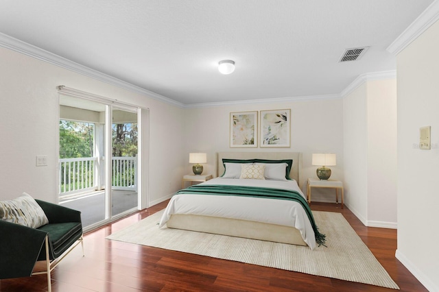 20123 Bay Cedar Ave, Tampa, FL 33647 - bedroom with crown molding, wood finished floors, baseboards, access to outside, and visible vents