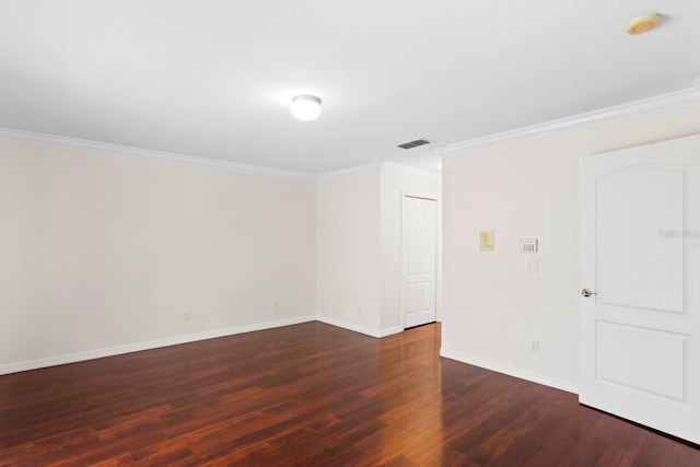 20123 Bay Cedar Ave, Tampa, FL 33647 - spare room with baseboards, crown molding, wood finished floors, and visible vents