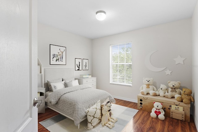 20123 Bay Cedar Ave, Tampa, FL 33647 - bedroom featuring baseboards and wood finished floors