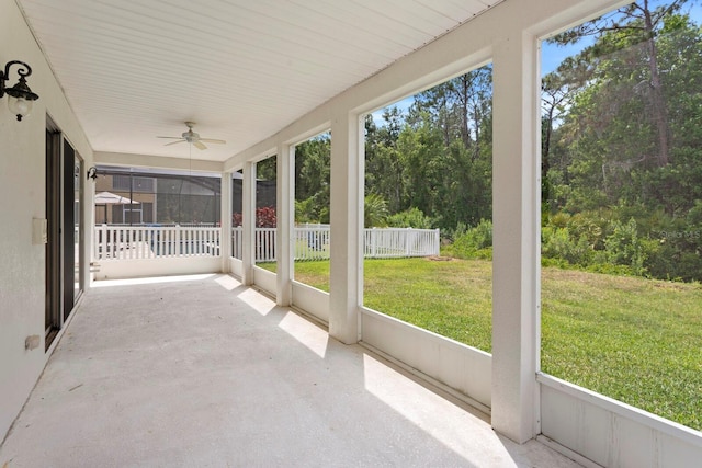 20123 Bay Cedar Ave, Tampa, FL 33647 - unfurnished sunroom with ceiling fan