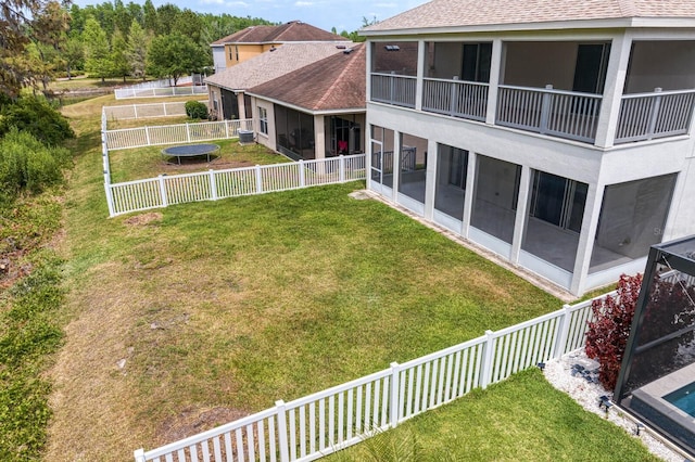 20123 Bay Cedar Ave, Tampa, FL 33647 - view of yard with a fenced backyard and a sunroom